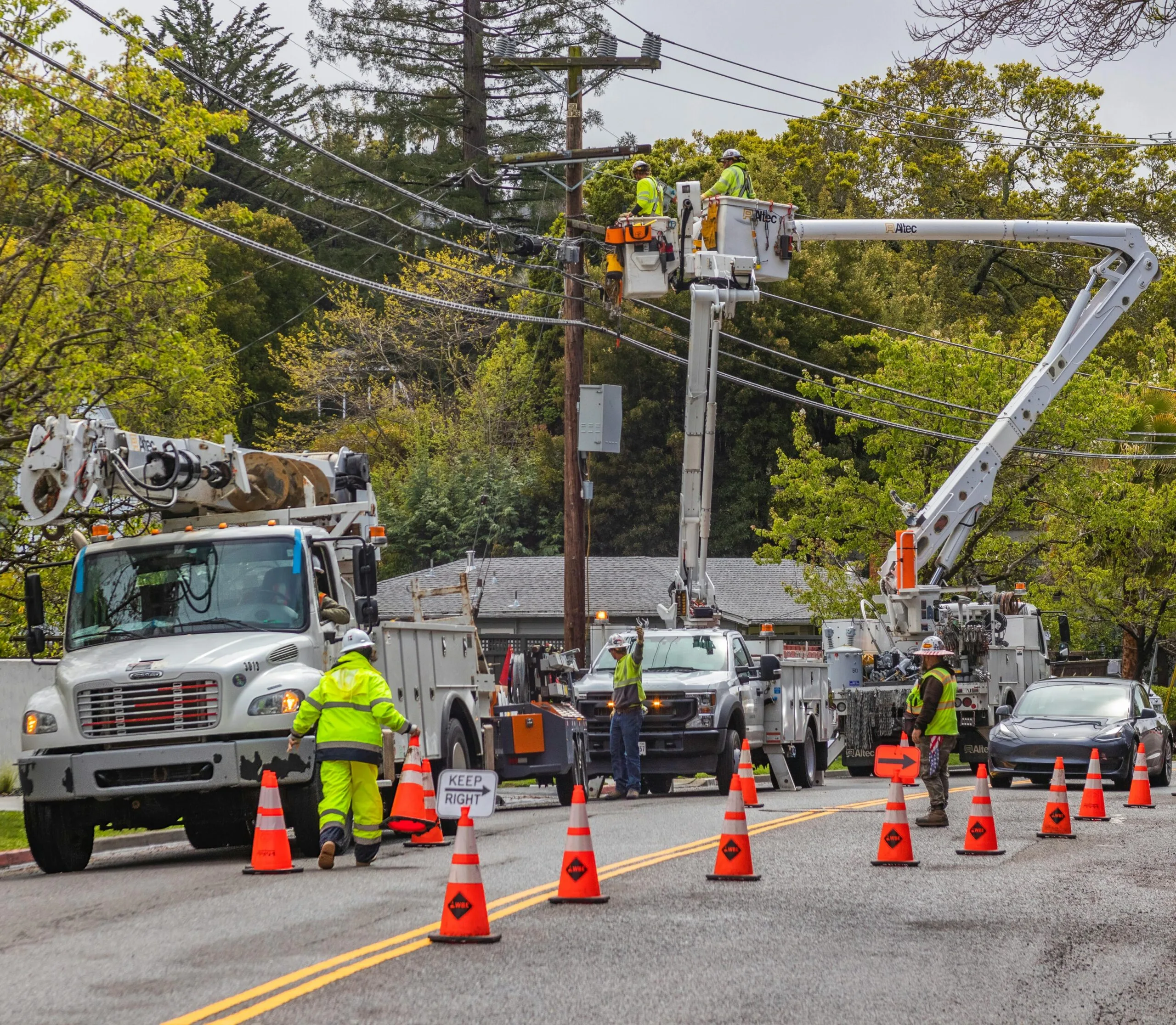 Utility field crew working on power line infrastructure