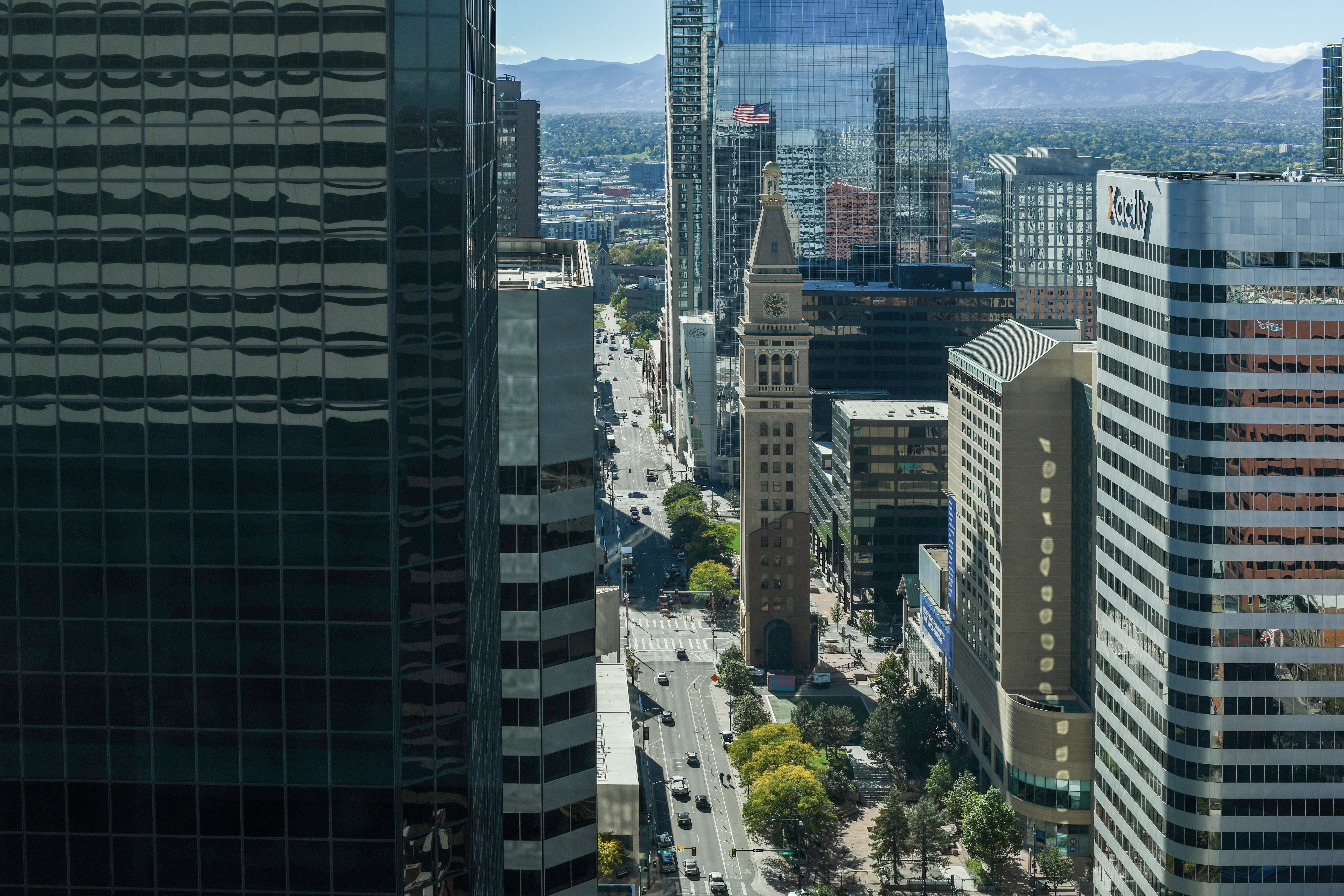 Denver skyline representing businesses across the city adopting AI