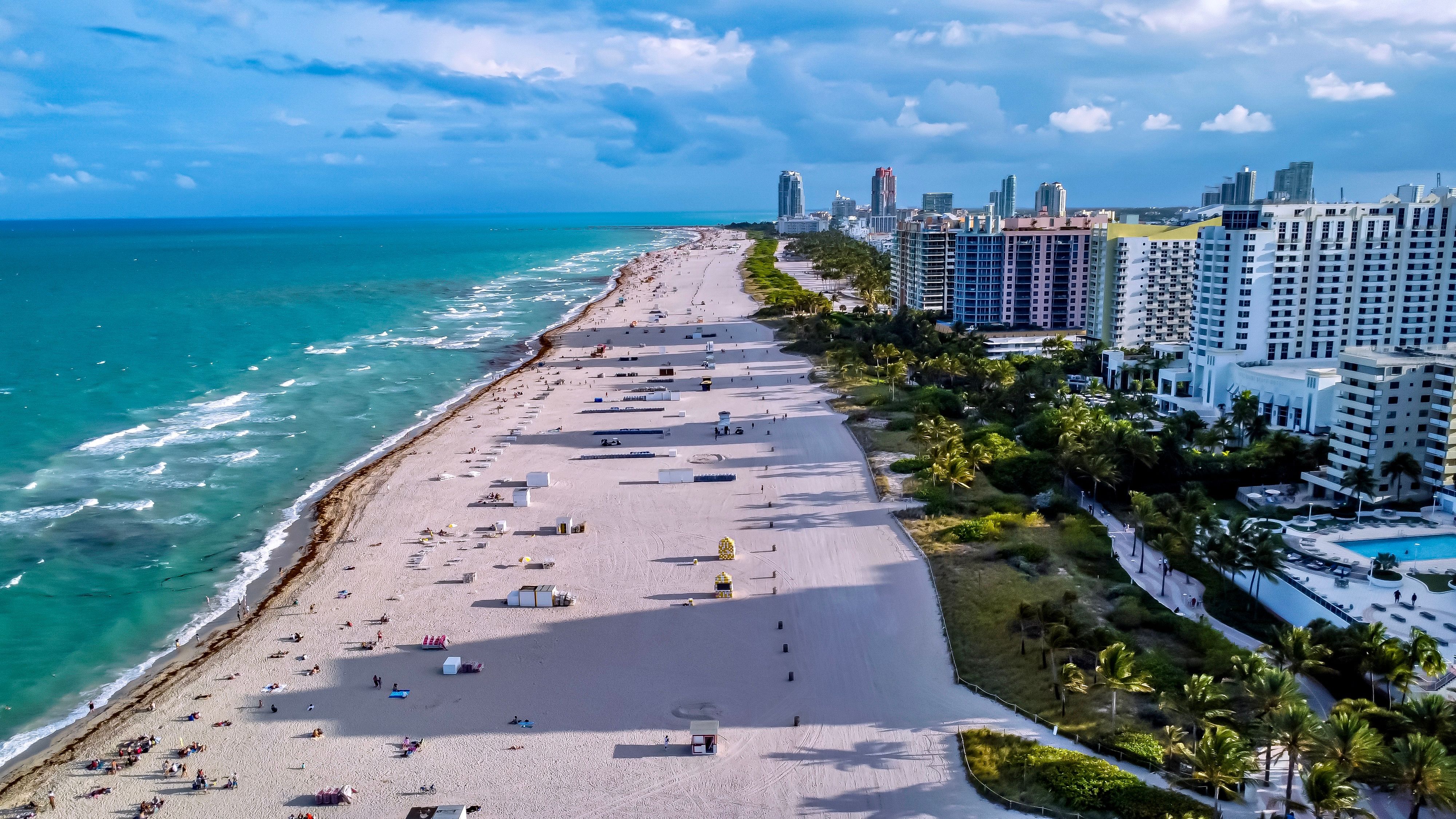 Miami skyline representing businesses across the city adopting AI
