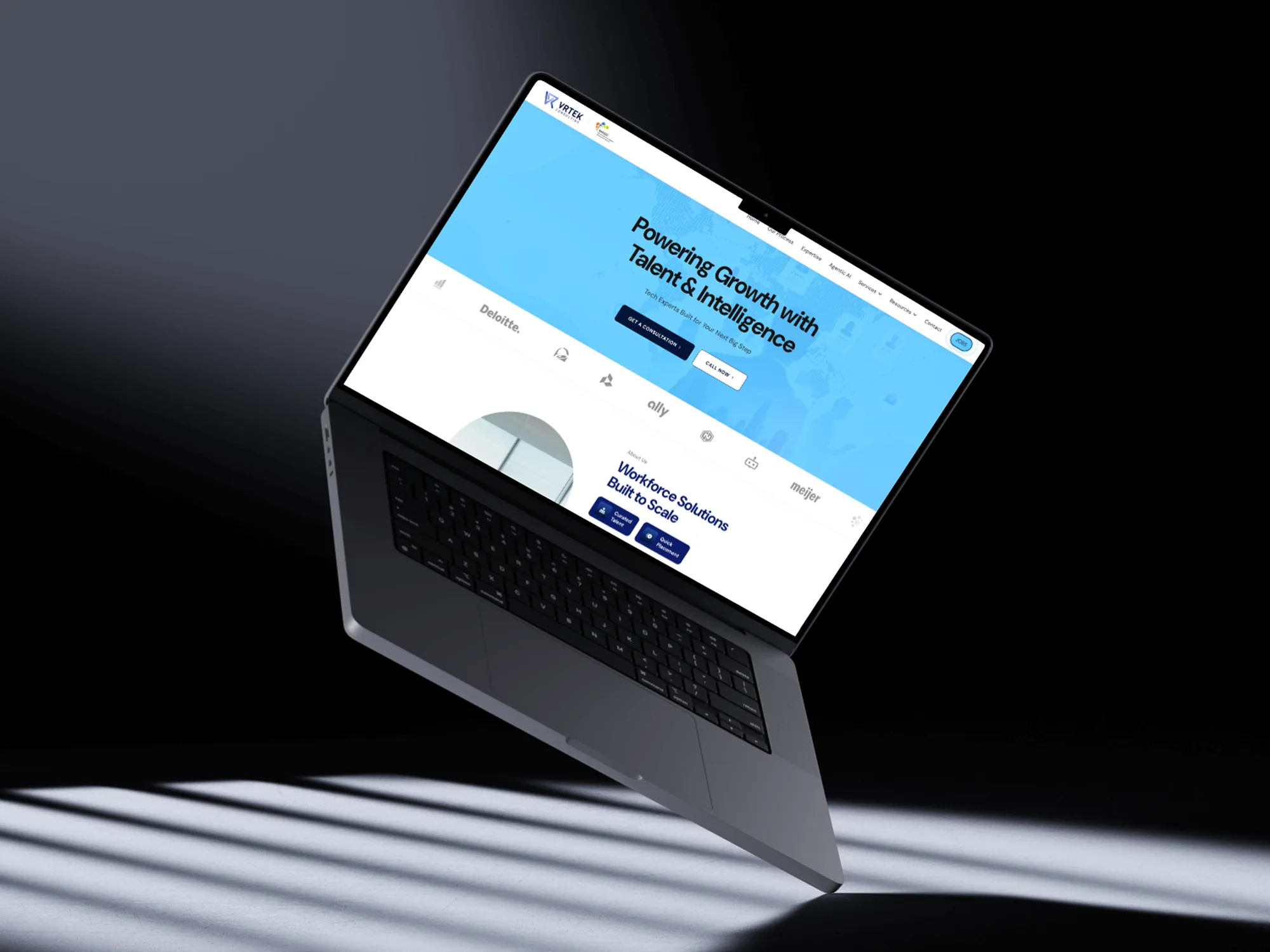 VRTek Consulting website on an angled laptop mockup